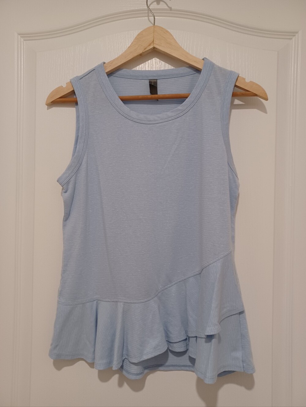 Light Blue Sleeveless Ruffle Hem Women's Top